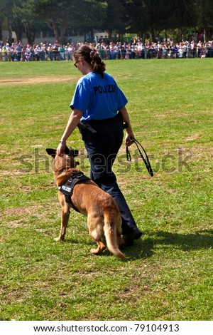 OBERURSEL, GERMANY - JUNE 12: police dogs show discipline at the Hessentag on June 12, 2011 in Oberursel, Germany. Hessentag is a big festival to present a city in the county of Hesse in Germany.
