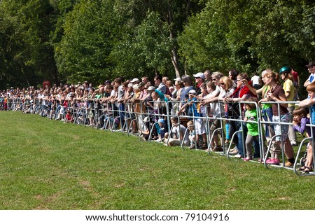 OBERURSEL, GERMANY -JUNE 12: spectators watch the police show at the Hessentag on June 12, 2011 in Oberursel, Germany. Hessentag is a big festival to present a city in the county of Hesse in Germany.