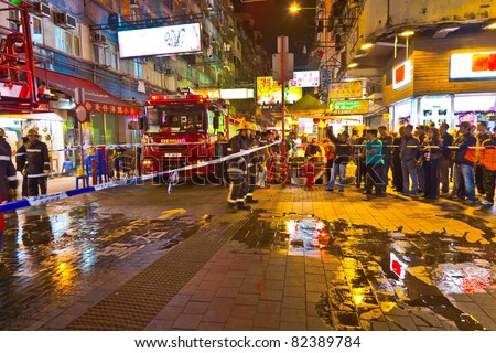 HONG KONG, CHINA - JAN 9: Police in Hong Kong saves the area after an acid attack on January 9, 2010 in Hong Kong, China. Nine tourists were injured and treated in hospital after acid attack..