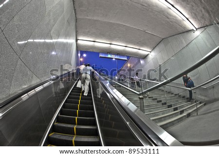DELHI, INDIA - NOV 09: people leave  the metro station on November 09, 2011 in Delhi, India. It is one of the largest metro networks in the world. The network consists of six lines with 142 Stations.