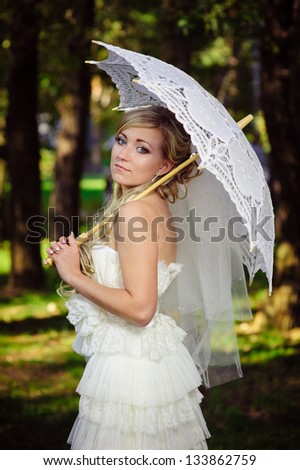 Happy young bride outside on wedding day - Copyspace. Wedding couple - new family! wedding dress. Bridal wedding bouquet of flowers