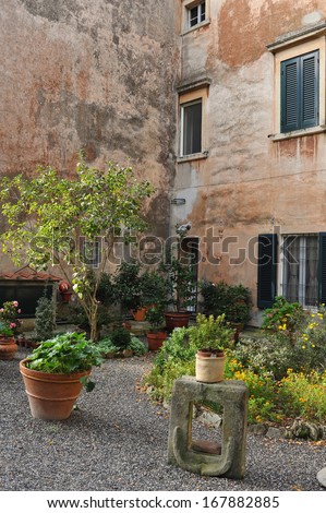 Picturesque nook of Tuscany. typical italian nook in tuscan village, Italy, Europe. view of Houses with garden / Old European Houses in the street, Italy.