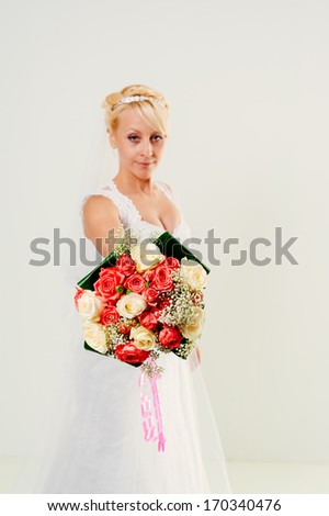 beautiful bride isolated on white background. Portrait of beautiful bride. Wedding dress. Bridal bouquet of flowers
