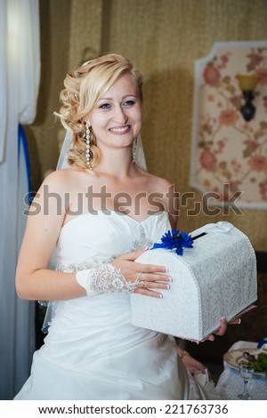 Beautiful sensual  bride in a luxurious restaurant at wedding day, newlywed romantic woman with wedding bouquet flowers. happy newlywed girl. marriage day. bride with flowers. Bride at restaurant.