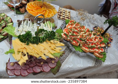 sandwiches. mixed food. Table with food and drink