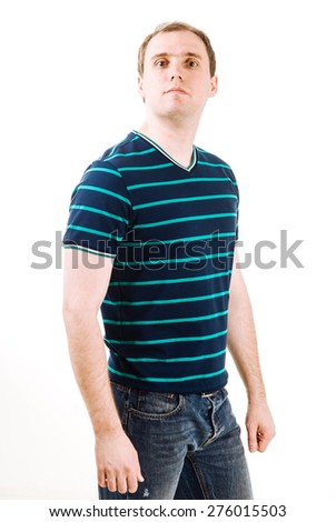 Young man with green polo shirt on a white background.