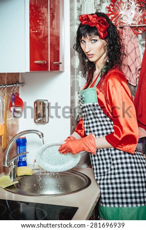 Beauty woman in panties on kitchen cooking. sexy housewife in the kitchen