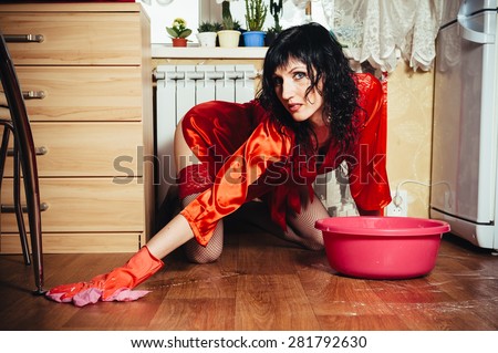 Sexy housewife washes floor in the kitchen, similar available in my portfolio