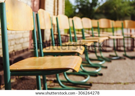 Chairs outdoor - toned image. Public outdoor event