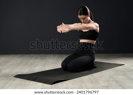 Similar – Image, Stock Photo Serious black sportswoman sitting on stone border in city