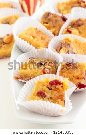 Golden lemon squares topped with dried cranberries