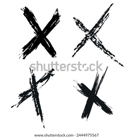 X black mark in grunge style. Hand crossed brush strokes. Crosshair symbols in brush style with black ink splashes. Graphic symbol of the cross sign. Set of vector X signs, grunge graphics collection