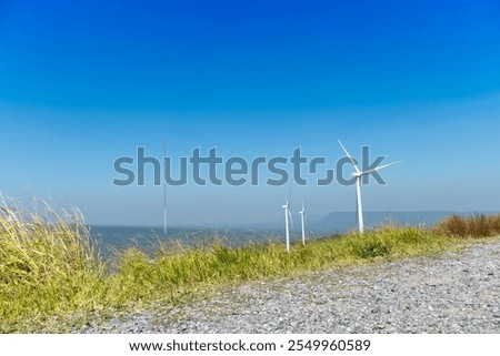 Image, Stock Photo Windmill at edge of breakwater