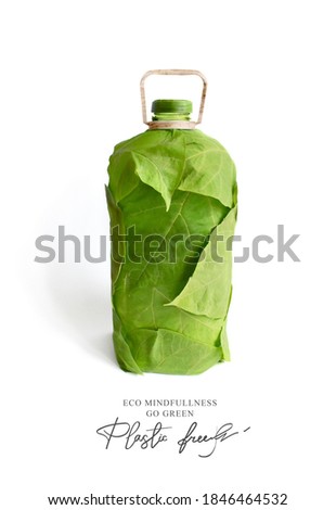 Plastic free Ecological poster. Say NO to plastic. Ban plastic pollution.
Biodegradable bottle, made with green sprout and leaves. Zero waste and Sustainable lifestyle. Think Green. 
