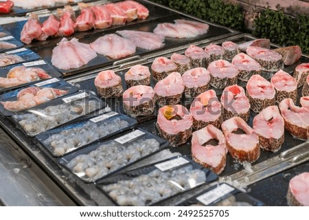 Similar – Image, Stock Photo Various fish fillets on kitchen table