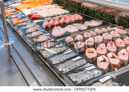 Similar – Image, Stock Photo Various fish fillets on kitchen table