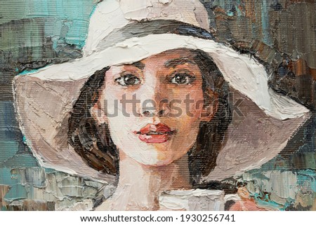 A girl in a white hat with a cup of coffee sits in a cafe.  Fragment of oil painting on canvas.	