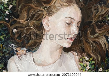 The girl lies in the grass. A bird sits on the woman's shoulder. Oil painting on canvas. Contemporary art.