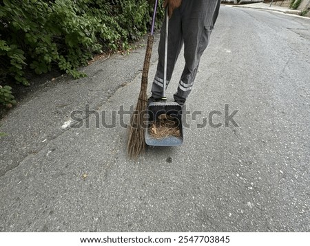 Similar – Image, Stock Photo Road worker cleaning city street with high pressure power washer, cleaning dirty public transport stops, Moscow, Russia