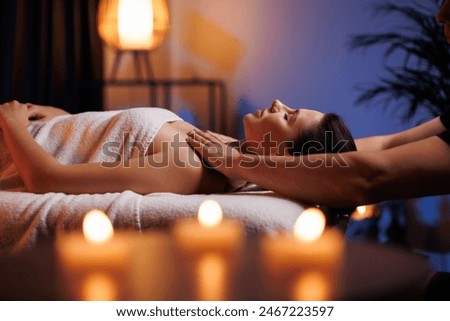 Image, Stock Photo Adult woman enjoying massage in spa salon