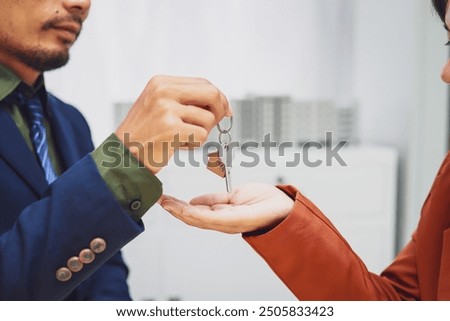 Similar – Image, Stock Photo A woman hands over a red envelope. Love letter. Love letter. Present.