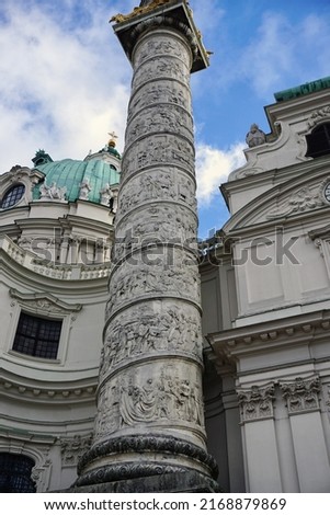 Column with spiral narrative, a part of the  famous Karlskirche (Saint Charles Church), a Baroque church located on the south side of Karlsplatz in Vienna                            Foto d'archivio © 