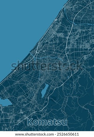 Detailed map of Komatsu City, Japan, rendered in a minimalist style. The map is dominated by a deep blue background, with white lines representing roads, waterways, and other geographical features.