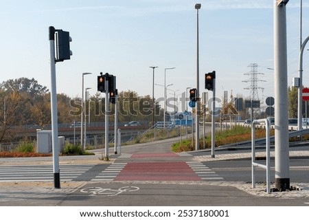 Similar – Image, Stock Photo Traffic light for pedestrians is green but lights red