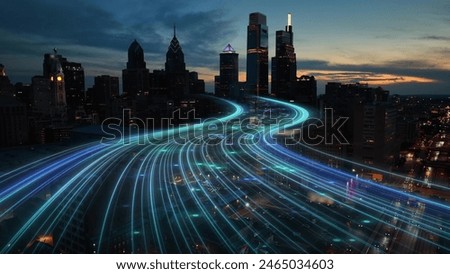 Smart city digital transformation development concept. Band lights over modern urban cityscape at night. New fast internet communication 5G technology. Fiber Optics