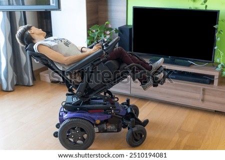 Similar – Image, Stock Photo Disabled young woman in kitchen with cat on her lap