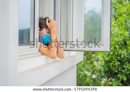 Similar – Image, Stock Photo Self isolate, with a face mask, in front of the silent last lights of day, near Manchester airport, UK, while waiting for the results of a pcr test from covid-19