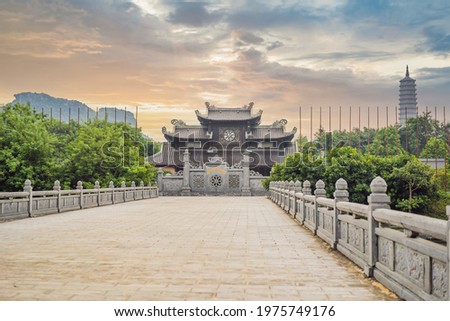 Similar – Image, Stock Photo Bai Dinh Tower Pagoda at the end of the winding road between the trees. . The biggest temple complex in Vietnam. Trang An, Nim Binh.