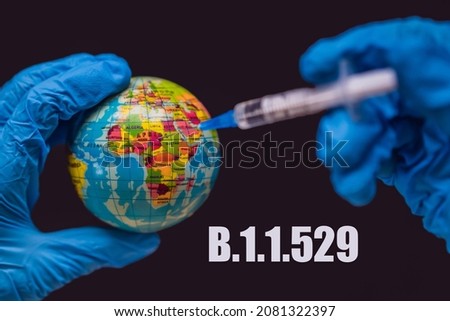 Omiсron. New strain of coronavirus B.1.1.529 found in Africa and around the world. Syringe vaccinates the globe, on a map of the Africa. Africa Coronavirus, Corona virus attack concept. Africa 