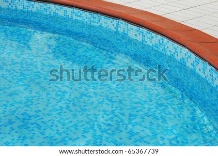 Clean water in a beautiful turquoise swimming pool detail