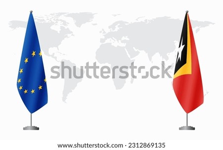 European Union and Timor-Leste flags for official meeting against background of world map.