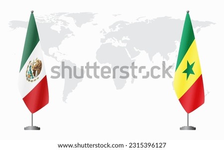 Mexico and Senegal flags for official meeting against background of world map.