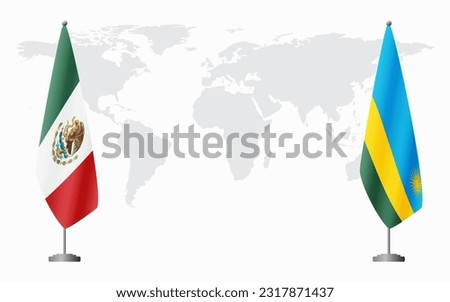 Mexico and Rwanda flags for official meeting against background of world map.