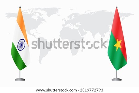 India and Burkina Faso flags for official meeting against background of world map.