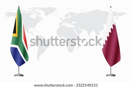 South Africa and Qatar flags for official meeting against background of world map.