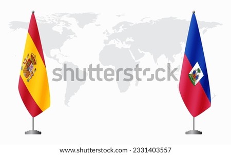 Spain and Haiti flags for official meeting against background of world map.