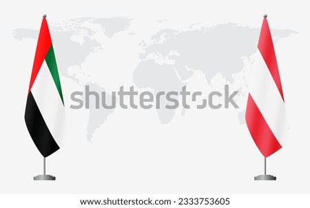 United Arab Emirates and Austria flags for official meeting against background of world map.