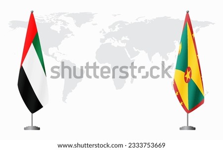 United Arab Emirates and Grenada flags for official meeting against background of world map.