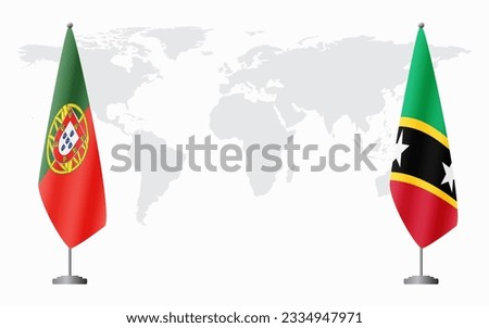 Portugal and Saint Kitts and Nevis flags for official meeting against background of world map.