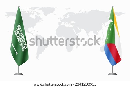 Saudi Arabia and Comoros flags for official meeting against background of world map.