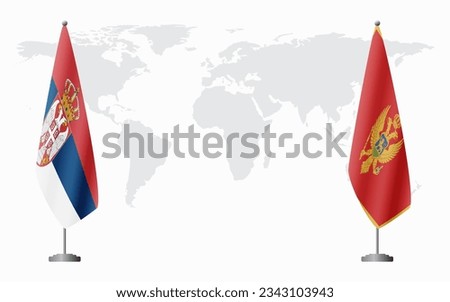 Serbia and Montenegro flags for official meeting against background of world map.