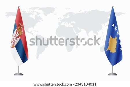 Serbia and Kosovo flags for official meeting against background of world map.