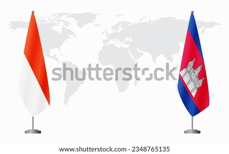 Indonesia and Cambodia flags for official meeting against background of world map.