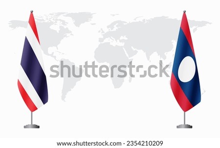Thailand and Laos flags for official meeting against background of world map.