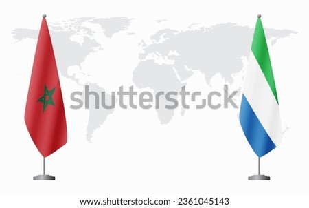 Morocco and Sierra Leone flags for official meeting against background of world map.