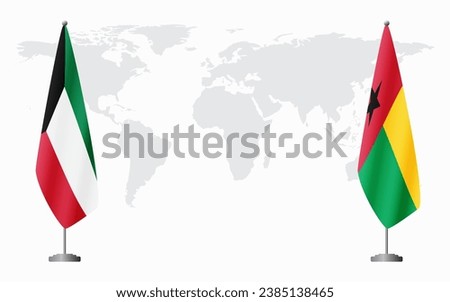 Kuwait and Guinea Bissau flags for official meeting against background of world map.